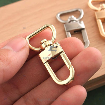ตะขอก้ามปูหัวหมุน ทรงรี ก้น D-Ring (แพ็คละ 2 ชิ้น/สี) | วัสดุโลหะผสมชุบสี (Zinc Alloy) ทนสนิม (No.6979)